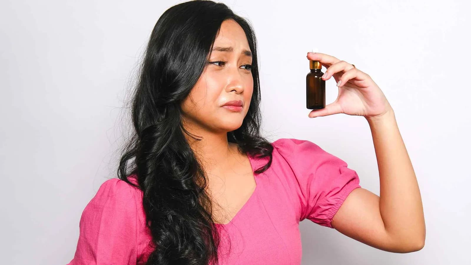Applying a face serum